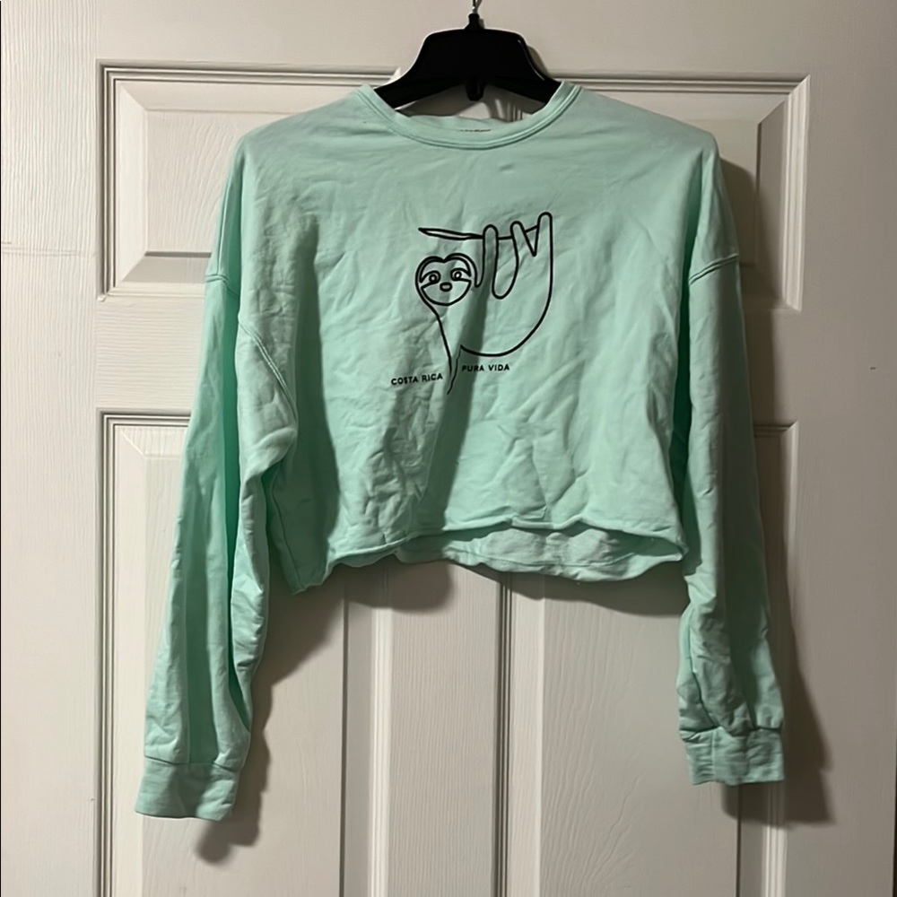 Mint Green Cropped Sweatshirt with Sloth Design